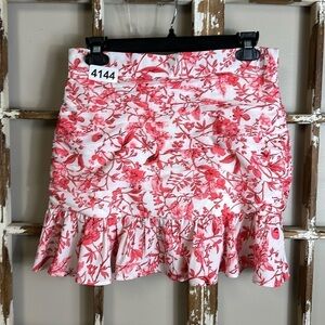 In the style size 10 14”w 16” length hidden zipper back. Ruffle hem